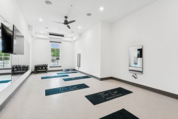 A yoga studio with mats at The Leo Myrtle Beach, Myrtle Beach, SC